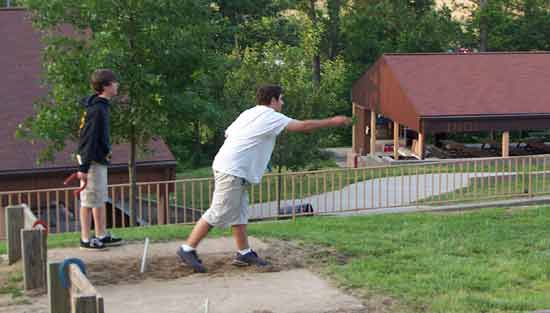 Brent and Sam playing horse shoes @ Holiday World's Stark Raven Mad