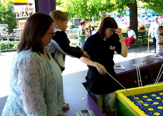 Bond playing a game at Waldameer Park, Erie Pennsylvania